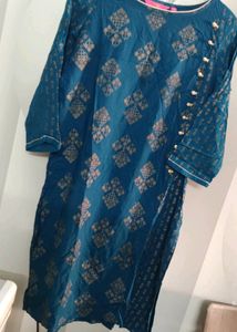 Tail Blue Colour Kurti With Beautiful Golden Pattern