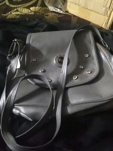 LEATHER HANDBAG