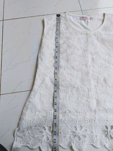 White SleevelessTop