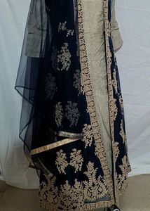 Beautiful Sober Gown With ShinyThread Work Shrug