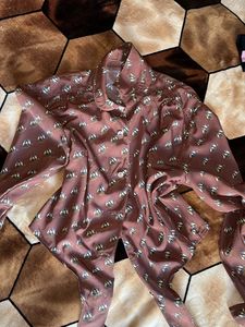 crazy button up top with a tying knot down