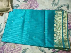 Teal Blue Saree with Gold Border