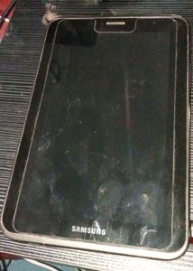 Samsung Galaxy Tablet With Blue Cover And Charger