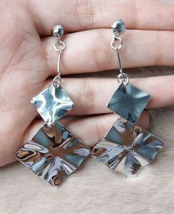 Statement Silver Danglers