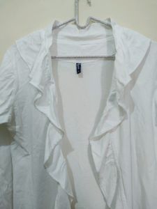 Voguish White Cover up Or Shrug With Ruffles