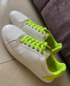 White Sneakers with Neon Green Accents