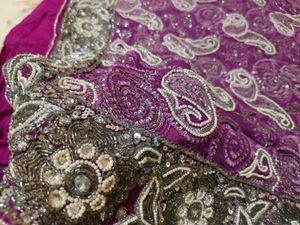 very heavy work purple saree