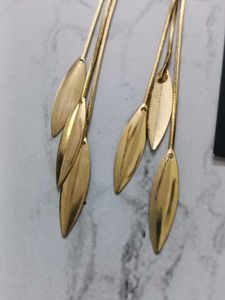 Elegant Gold Tone Dangle Earrings