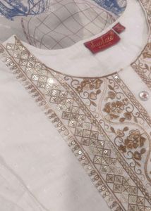 Elegant White Embroidered Kurti