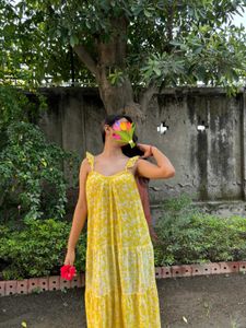backless yellow flowy sundress