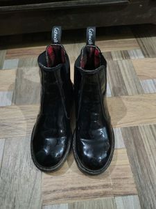 Glossy Catwalk Boots