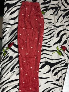 red joggers with white hearts