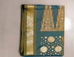 Elegant Teal &amp; Gold Saree