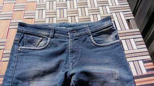 Distressed Denim Jeans