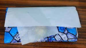 Floral Print Blue Clutch .