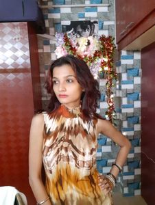 Women Sleeve Less Brown Printed Top