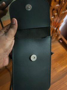 Black mobile sling bag