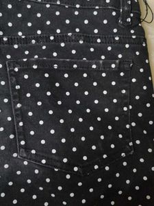 A beautiful black hipster shorts with polka dots.