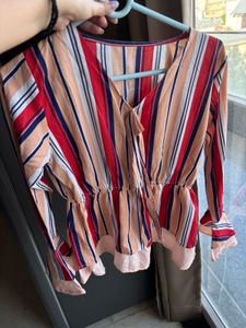 A beautiful peplum top with strips