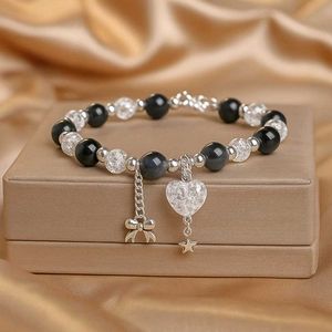 Beaded Silver Eclipse Charm Bracelet