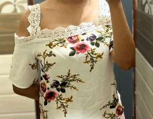 White Floral off-shoulder Top. No stains or damage. Never worn. Good as new!!