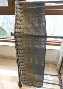 Elegant Kurta with Dupatta in shades of Green.