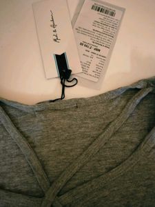 Effortless Chic: Twisted-Front Grey Top