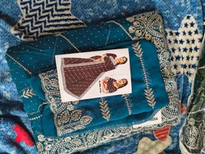 Georgette saree with seroski stone and silver work