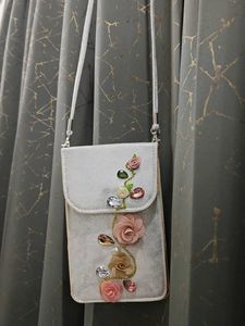Silver Sling Bag with Floral Detail