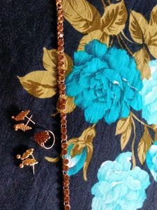 kamar band 2 pair of gold plated earrings and ring