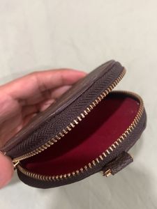 Mini Clutch On Any Bag Louis Vuitton