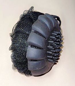 A two-sided bath puff Or Loofah