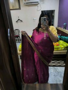 Megenta rajasthani tie-dye saree with bow blouse
