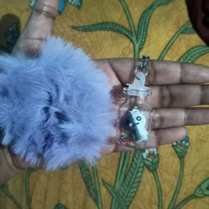 An Army Keychain With Purple Scrunchies