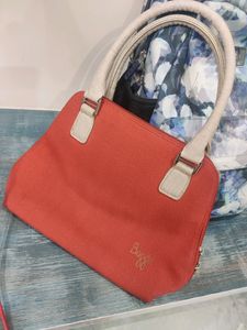 Baggit Red and beige hand bag