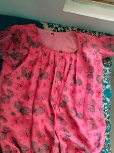 This Is A Top With Floral Print.