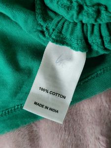 GREEN CROP TOP WITH SIDE STRINGS