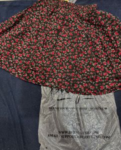 Floral Print Mini Skirt with brand tag