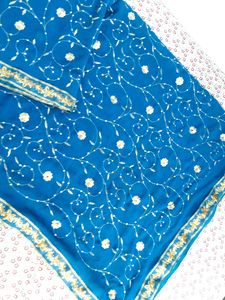 ✨ Teal Blue Saree with Golden Floral Elegance ✨