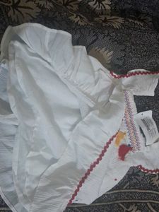 White Dress with Colorful Details