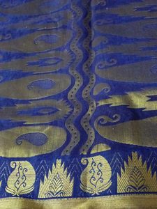 ElegantBrownFancy Pattu Sareewith blue border.