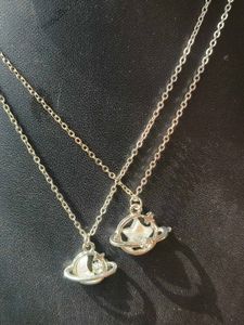 Silver Bow Pendant Necklace