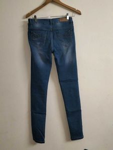 Distressed Denim Jeans