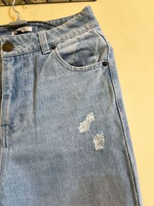 Ripped Light Wash Denim Jeans