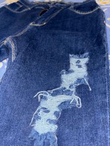 Ripped Dark Blue Denim Jeans