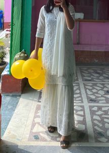 White Kurta And Flare Plazzo Set
