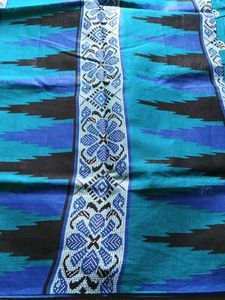 Teal Cotton Saree with Floral Motifs