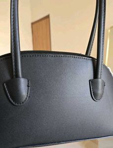 Sleek Black Mini Crescent Shoulder Bag