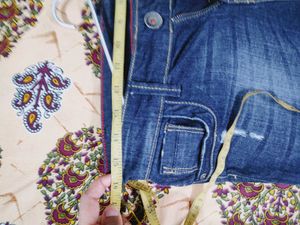 Distressed Denim Capri Pants