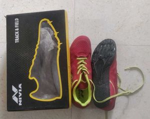 Nivia Sprint shoes with spikes for running race